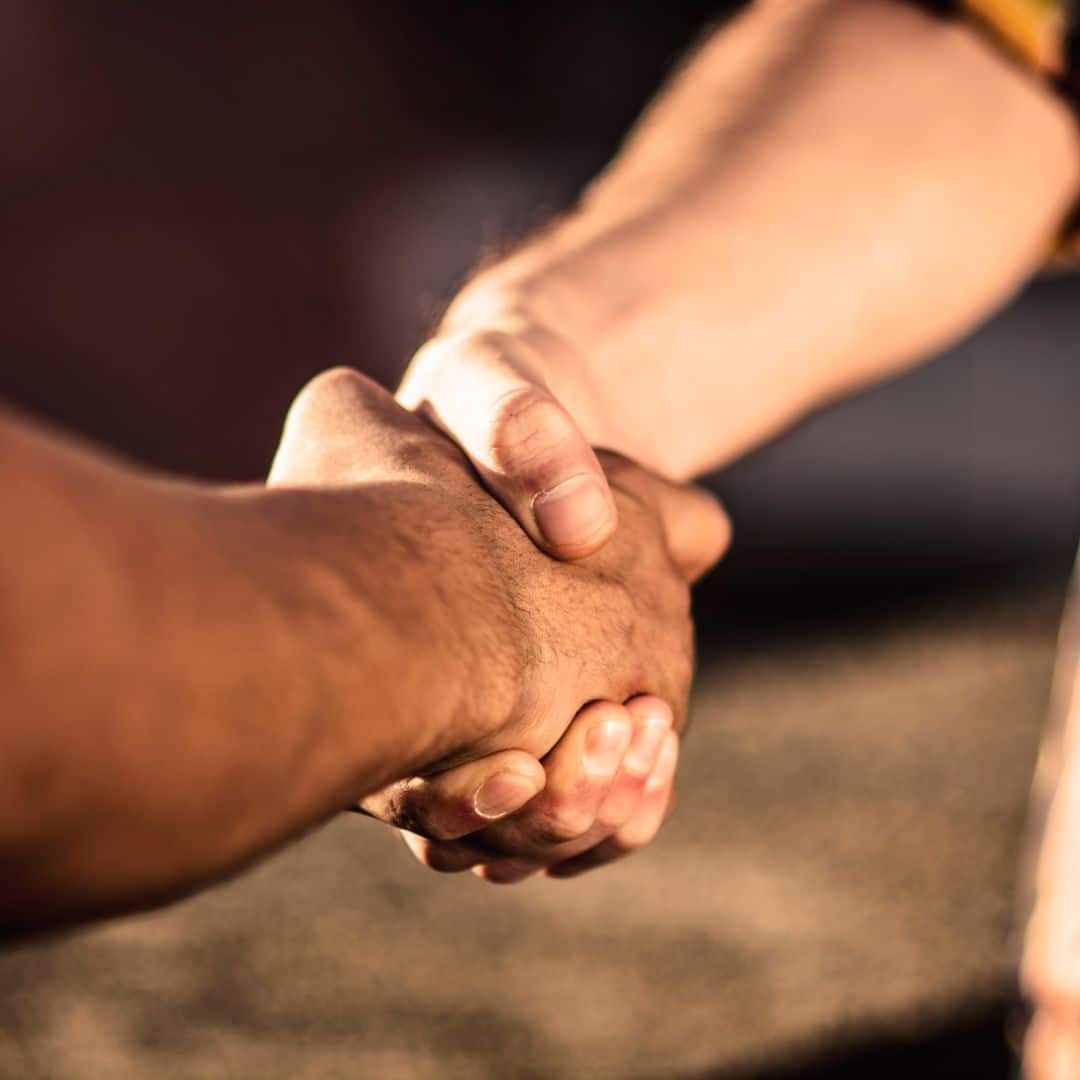 Two people handshake