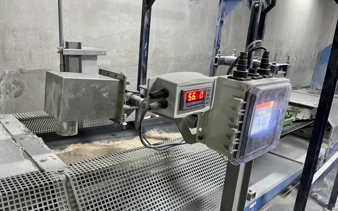 This image shows an IR 3000, a near infrared moisture sensor from MoistTech, detecting the moisture in sand.
