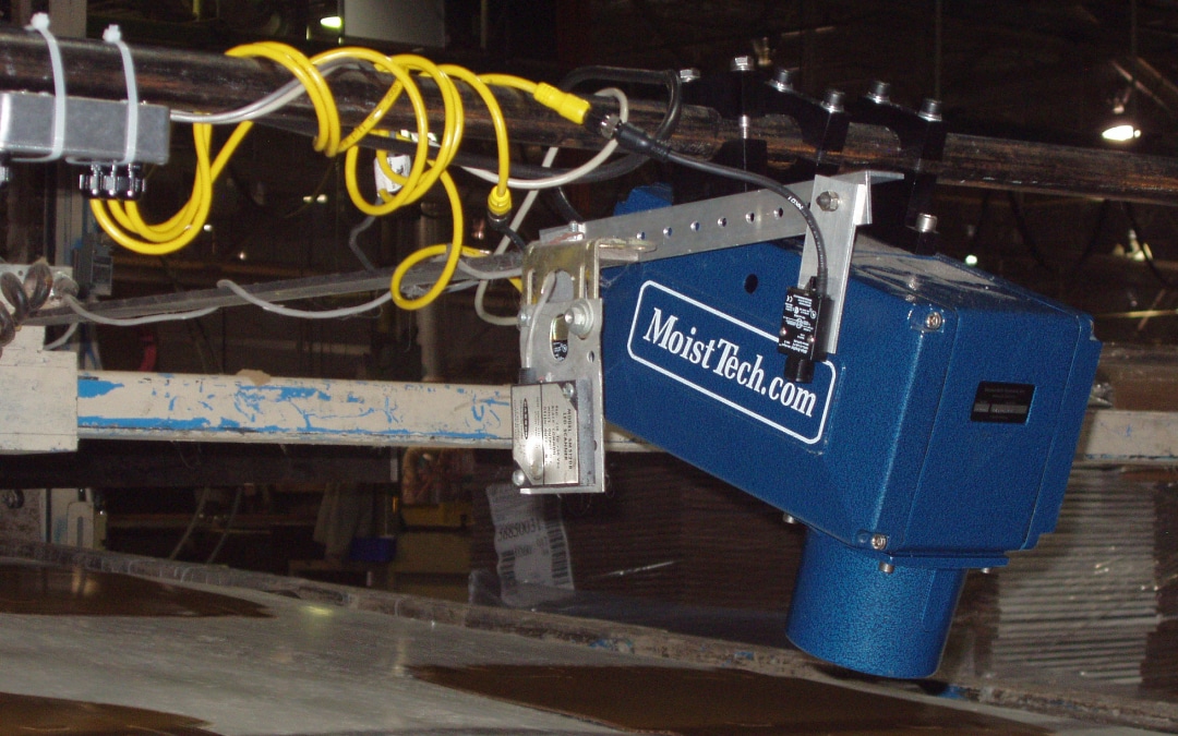 MoistTech's IR-3000 on-line moisture measurement sensor gathering data on pharma powder.