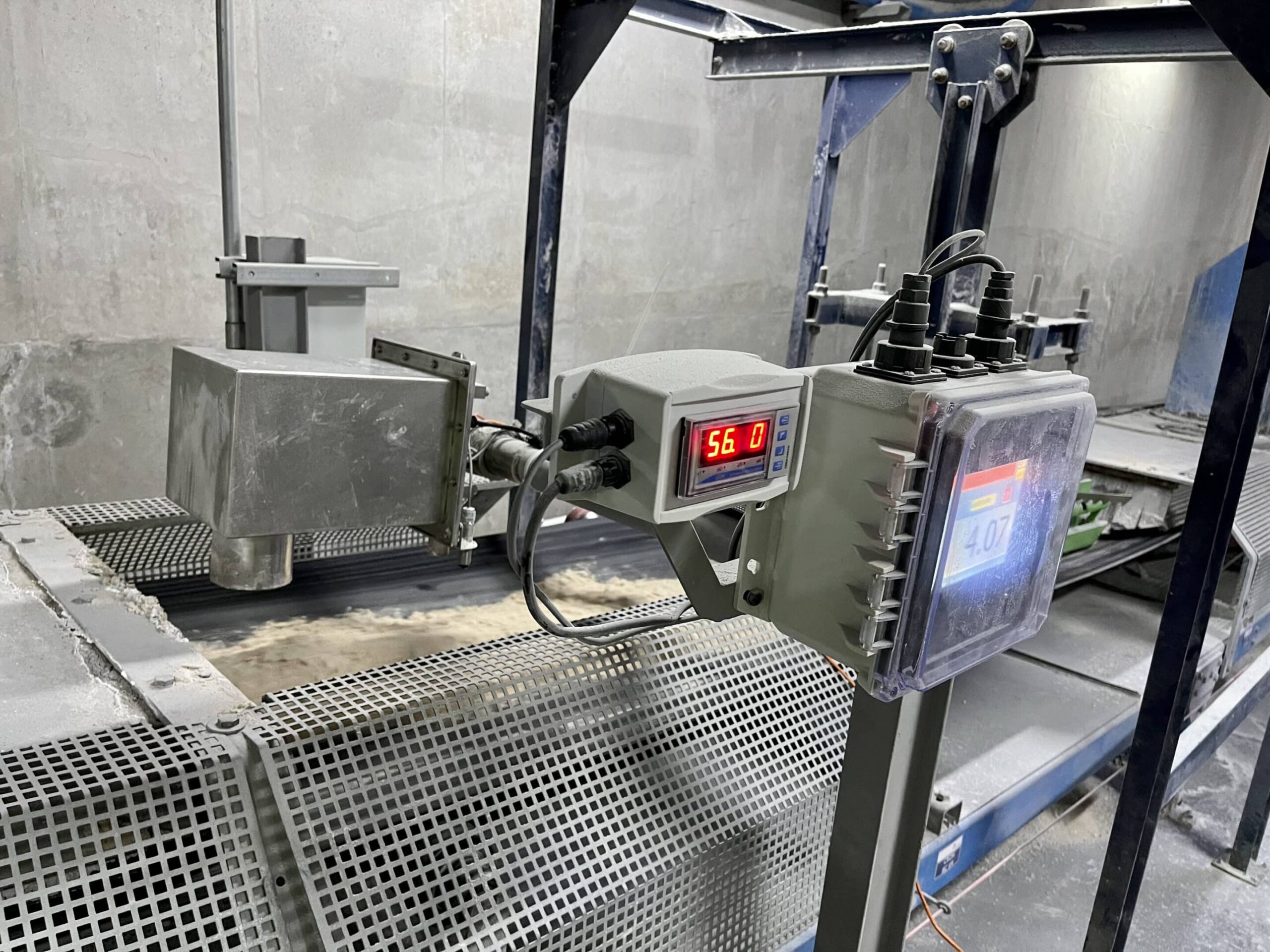 This image shows an IR 3000, a near infrared moisture sensor from MoistTech, detecting the moisture in sand.