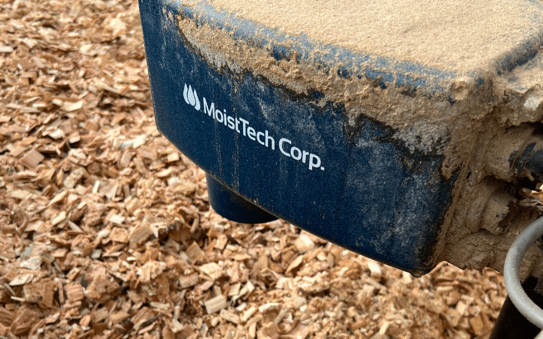 MoistTech's IR-3000 moisture sensor being used in the wood manufacturing industry to measure moisture content.